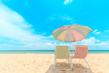 Ka-ron Beach at Phuket , Thailand. White sand beach with beach umbrella. Summer, Travel, Vacation and Holiday concept.