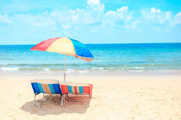 Ka-ron Beach at Phuket , Thailand. White sand beach with beach umbrella. Summer, Travel, Vacation and Holiday concept.