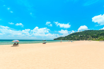 Ka-ron Beach at Phuket , Thailand. White sand beach with beach umbrella. Summer, Travel, Vacation and Holiday concept.