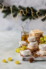 Variety of French Cheeses in a Dusty Pantry