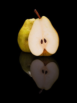 One pear cut in half