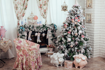 Christmas and New Year decorated interior room with presents and New year tree.shabby chic