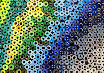 Colored threads in a reel