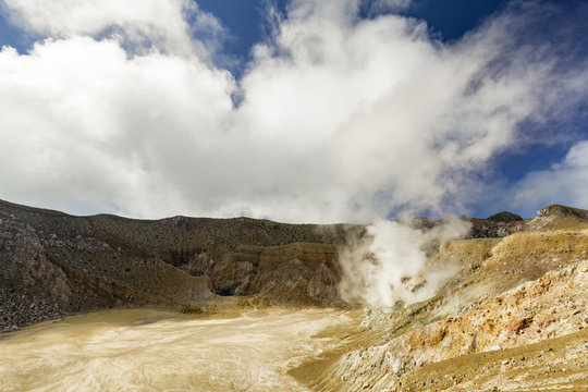 Clouds begin to form over the active crater of Mount Egon on Flores Island in Indonesia.
