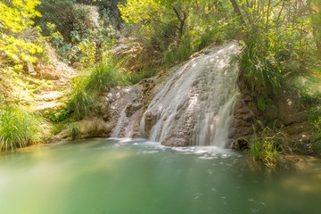 Waterfall at Polilimnio in Greece. A touristic destination.
