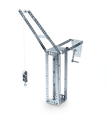 metal toy hoisting crane isolated on white