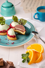 Delicious orange and chocolate cakes in the mirror mint glaze.