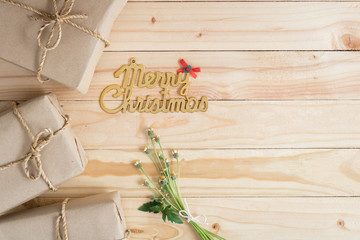 vintage Christmas wood background with gifts and copy space.