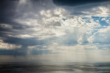 Sun Rays Through Thunder Clouds.