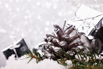 Christmas composition of Christmas tree toys on a silver background