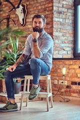 A man in a room with loft interior.