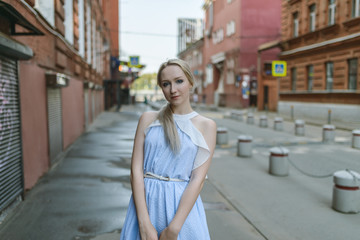 Outdoors portrait of beautiful young woman. Selective focus.