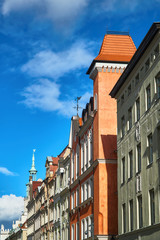street and facades of the townhouses in Poznan.