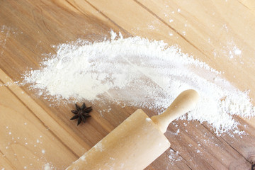 Scattered flour and rolling-pin, cones