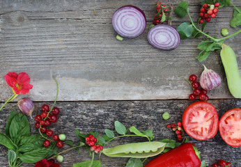 Vegetables, plants on wood