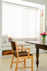 Modern white wooden chairs in dining room