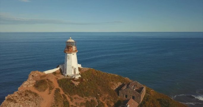 Aerial view of the lighthouse Brinera, octahedral tower in the shape of truncated pyramid with lantern. It's 72m height built in 1919 in Far East of Russia