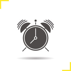 Ringing alarm clock glyph icon