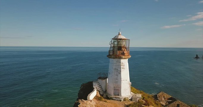 Beautiful aerial panoramic view of the lighthouse Brinera, octahedral tower in the shape of truncated pyramid with lantern. It's 72m height built in 1919 in Far East of Russia