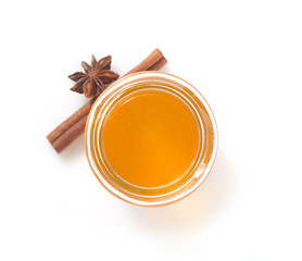 jar of honey on white background