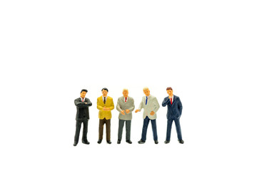 Miniature people, group of businessman standing isolated on white background using as business concept