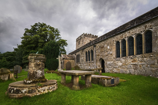 Hubberholme church St Michael and all Angels with cemetery and beautiful old Norman style architecture