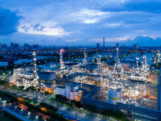 Aerial view of twilight of oil refinery ,Shot from drone of Oil refinery and Petrochemical plant at dusk , Bangkok, Thailand