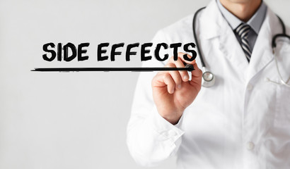 Doctor writing word Side Effects with marker, Medical concept