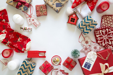 Christmas background with handmade presents wrapped in craft paper,cup of hot chocolate. Flat lay. Space for copy