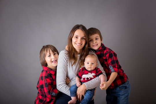 Family Christmas Portrait, Isolated On Gray, Studio Image