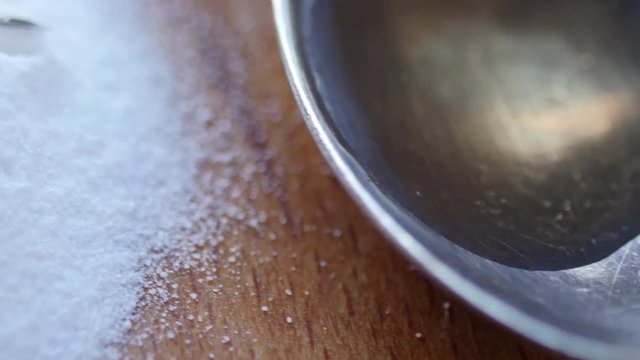 Money, drug, spoon and syringe with heroine on a table. 4K UltraHD video footage