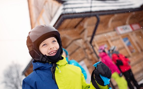Little boy in ski helmet