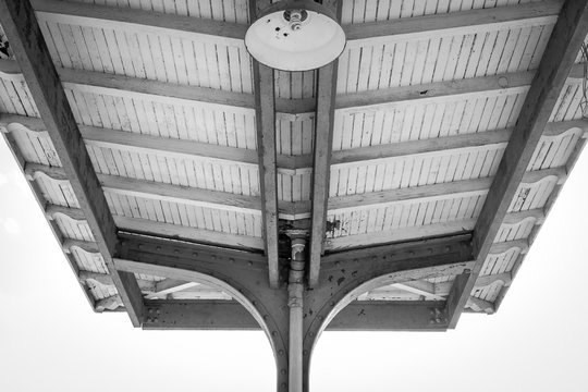 Outdoor  train bus station roof. Old covered architecureal structure. Minimal abstract design. Abandoned train bus depot. Architecture design and detail.