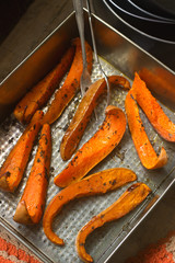 Pumpkin slices baked with aromatic herbs and vegetable oil.