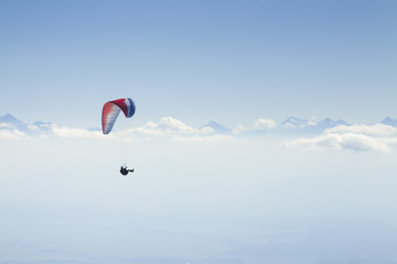 Fototapeta na wymiar Paraglider in Mid-Air, Tatra Mountains