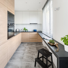 Kitchen with wooden furniture