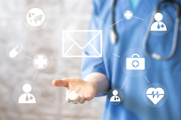 Doctor pushing button mail message virtual healthcare in network medicine.