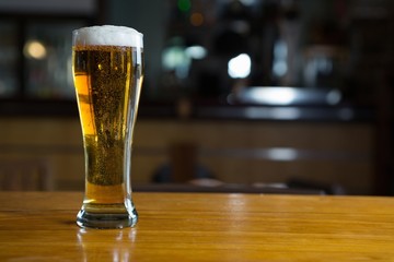 Close-up of beer glass on the counter