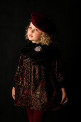 Pretty girl in brown old-fashioned costume