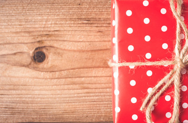 Gift on wooden table. Christmas background. top view