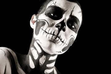 Pretty woman with skeleton tattoo