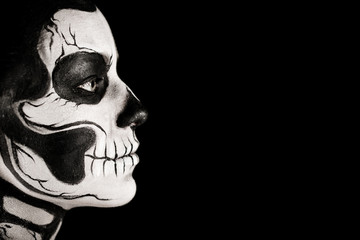 Pretty woman with skeleton tattoo