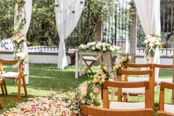 Fototapeta na wymiar Details of wedding ceremony, flowers and petals for decoration.