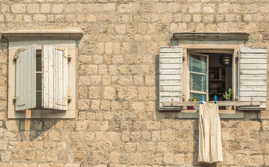 Fototapeta na wymiar Fragment of the buildings of the old town of Budva, Montenegro. The first mention of this city is more than 2600 years ago.