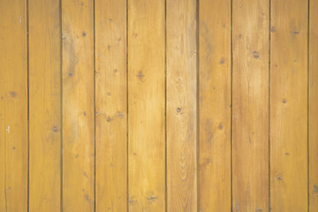 Yellow thin boards. Knots in wood. Wooden background for design