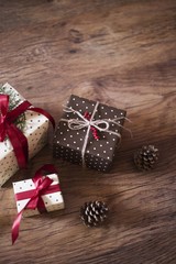 christmas gifts on wooden background