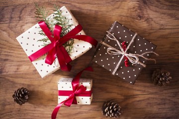 christmas gifts on wooden background