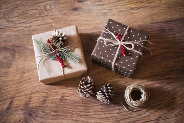 christmas gifts on wooden background