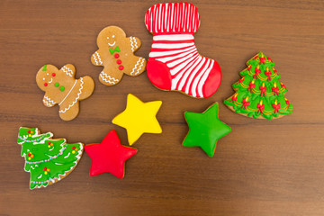 Festive tasty Christmas cookies on wooden table. Top view