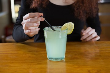 Waitress making a drink